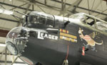 Nose art on one side of the Lancaster, showing the number of sorties carried out. The icecream cones are for sorties over Italy, (just one cornetto)